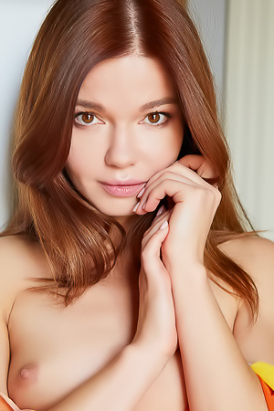 Beautiful brunette Nedda A is demure in a silk wrap