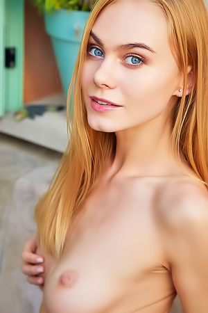 Nancy A - Gorgeous blonde model goes naked on the outside