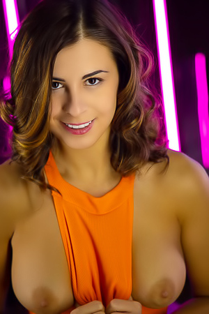 Alice Kelly Voluptuous Beauty Tugs At Her Vibrant Orange Bodysuit