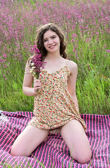 Carrie Rides Up To Expose Her Sexy Booty When She Stretches Out On A Blanket