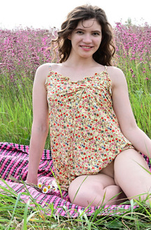 Carrie Rides Up To Expose Her Sexy Booty When She Stretches Out On A Blanket