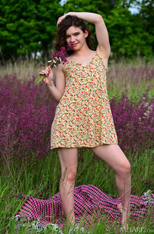 Carrie Rides Up To Expose Her Sexy Booty When She Stretches Out On A Blanket