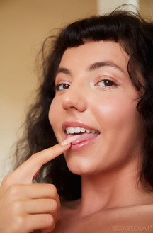 MitziX Spreads The Lips Of Her Shaved Pussy To Reveal The Luscious Pink Interior