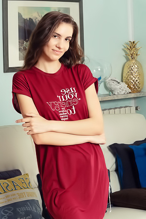 Lili Charmelle Revealing The Intricate Folds Of Her Shaved Pussy With A Smile