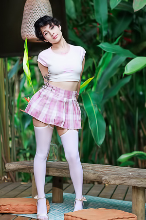 Dakota Jhons Entices In White Top And Plaid Skirt Outdoors Posing Seductively With High Heels On