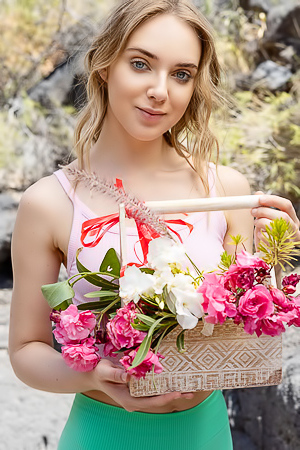 Oxana Chic Shows Off In Crop Top Gathering Flowers, Teasing View Under Shorts