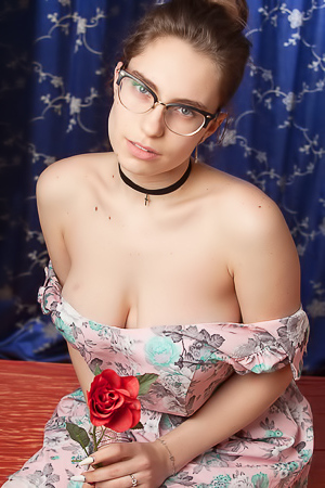 Liza Loo Flaunts Her Shaved Pussy And Large Breasts In Alluring Poses