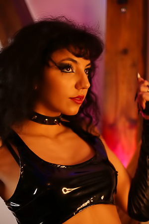 Mitzi X Explores Her Kinky Side In A Dungeon With Masturbation And Dominant Poses