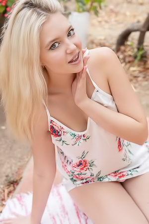 Sensual Nikoleta Entices With Her Seductive Striptease In The Garden