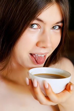 Marichka Glory Cravings: A Nude Brunettes Tense Balance Between Cup and Chair
